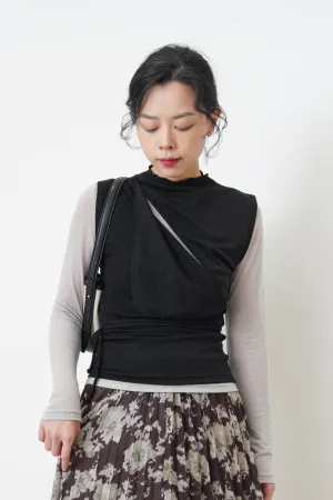 Black 3D asymmetrical vest w/ cut out detail